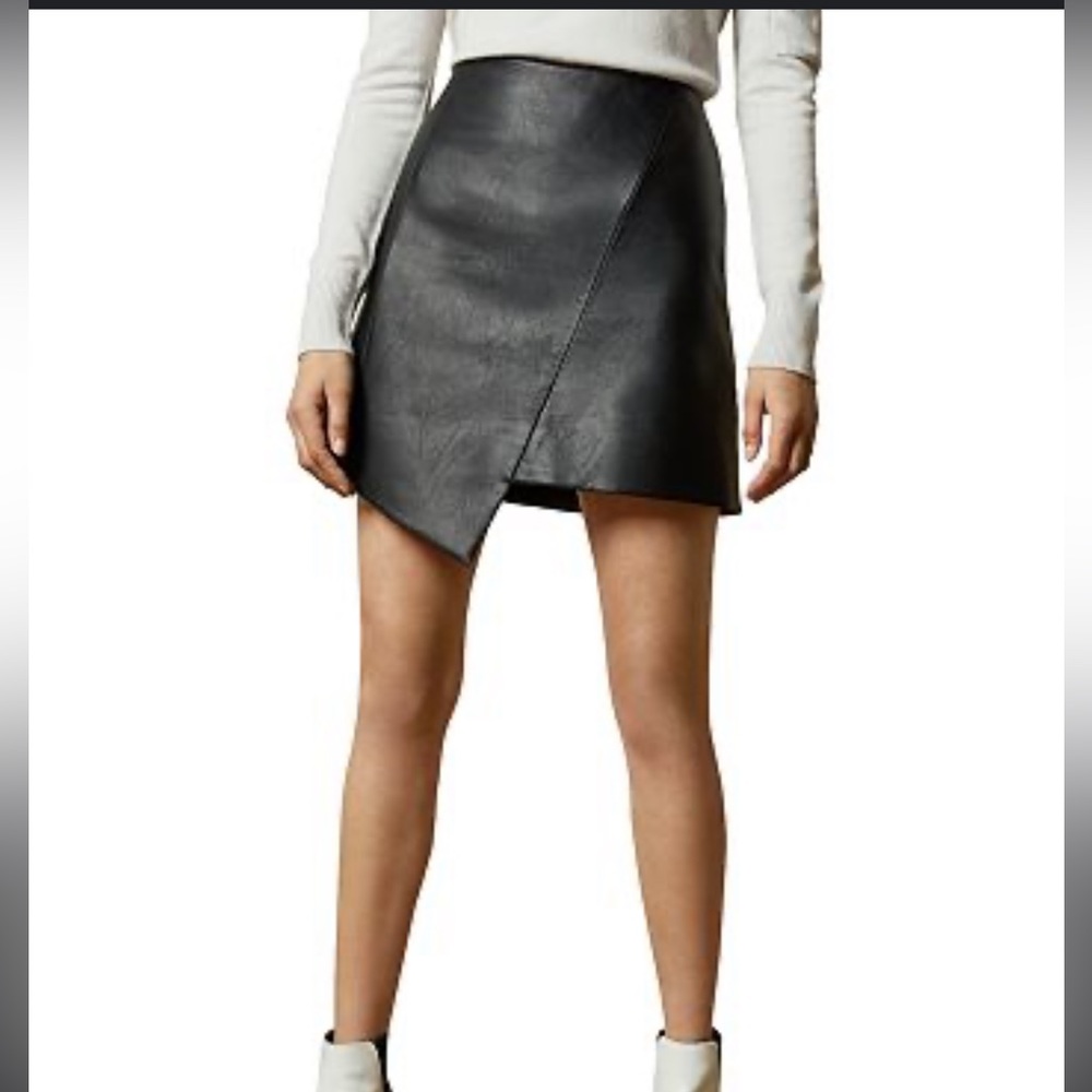 Ted Baker OOLIVE , black faux leather skirt. Size 1. Excellent condition.